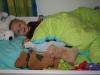 Jesse in bed met zijn eigen baby., geplaatst door mama Lizanne op 2007-11-05